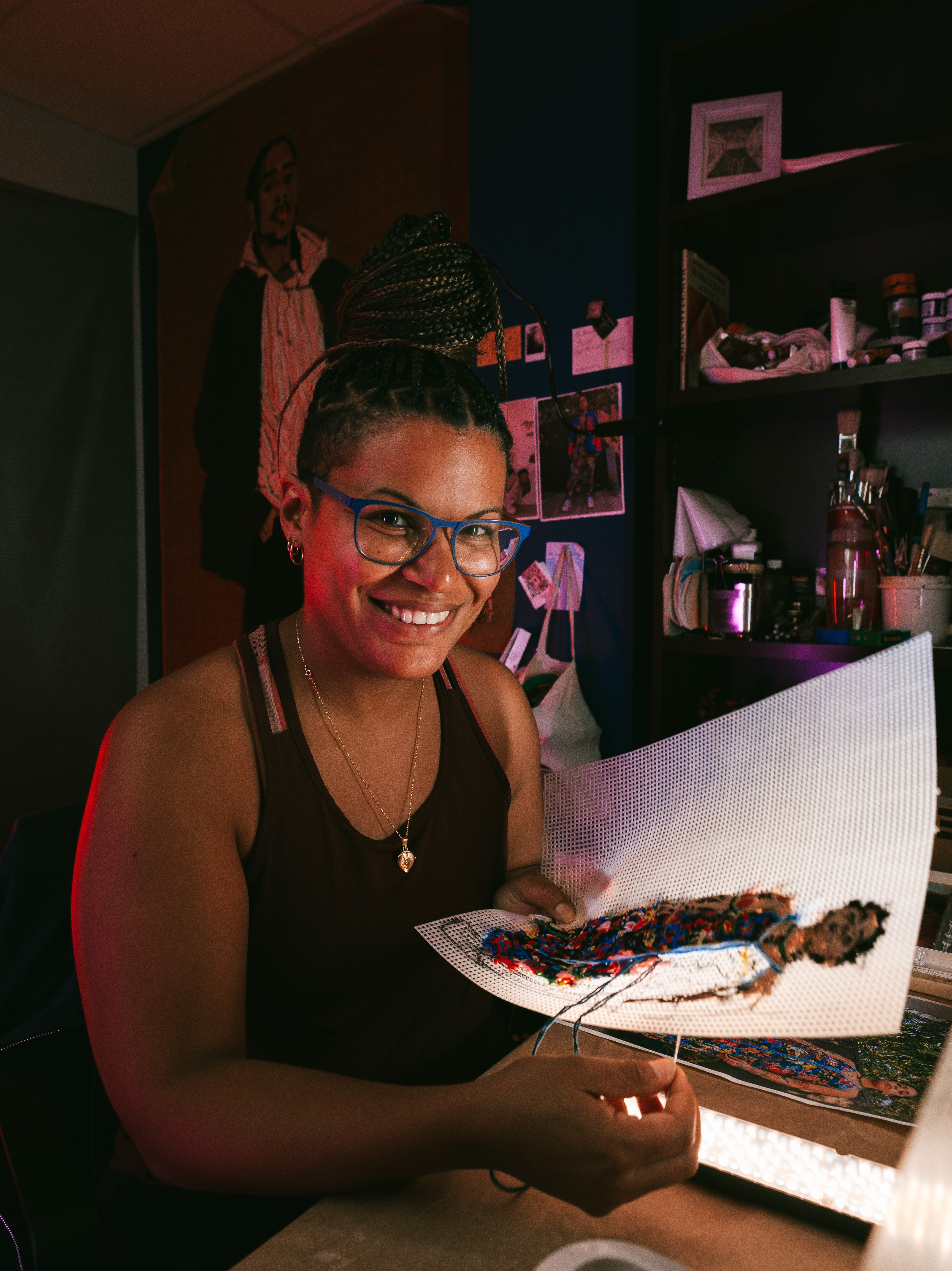 Kandy Lopez working on a portrait. Photo by ShootmeJade.