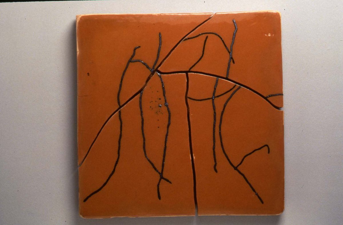 Jim Melchert’s work titled Copper Where It Ends, 1991, glazed Mexican paver, 15.5 x 15.5 inches.