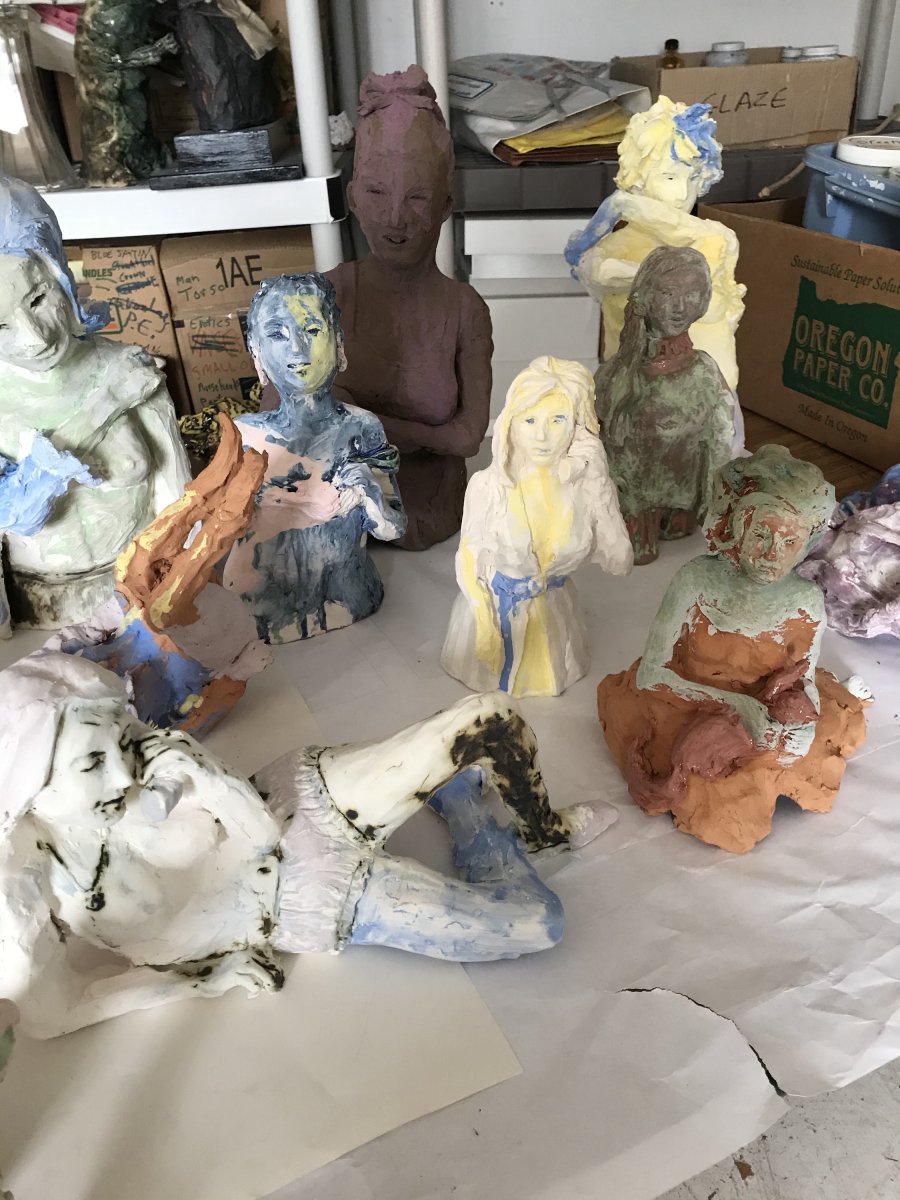 Multiple sculptures about to be glazed. 