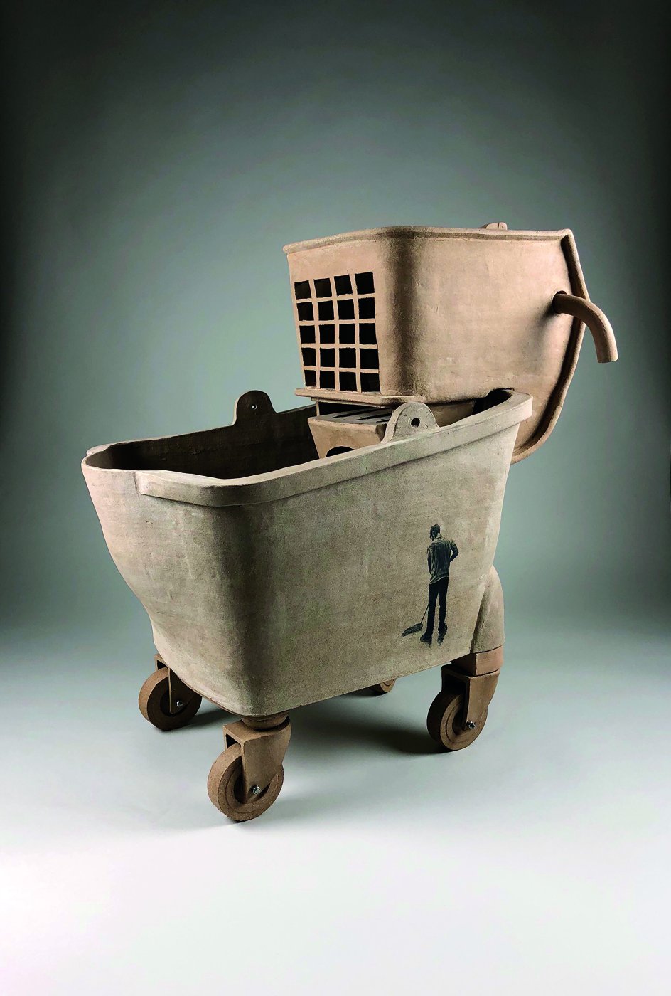 Functional mop bucket made of stoneware.