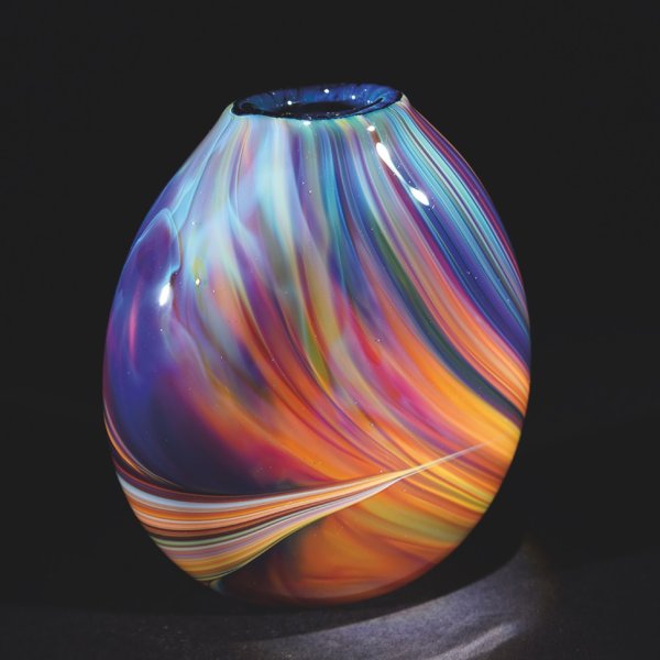 Vase with oranges, blues, purples, pinks, and yellows creating a sweeping visual.