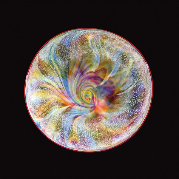 Corona hyperspace disk 22 inches in diameter with a swirling image towards the center of many colors.
