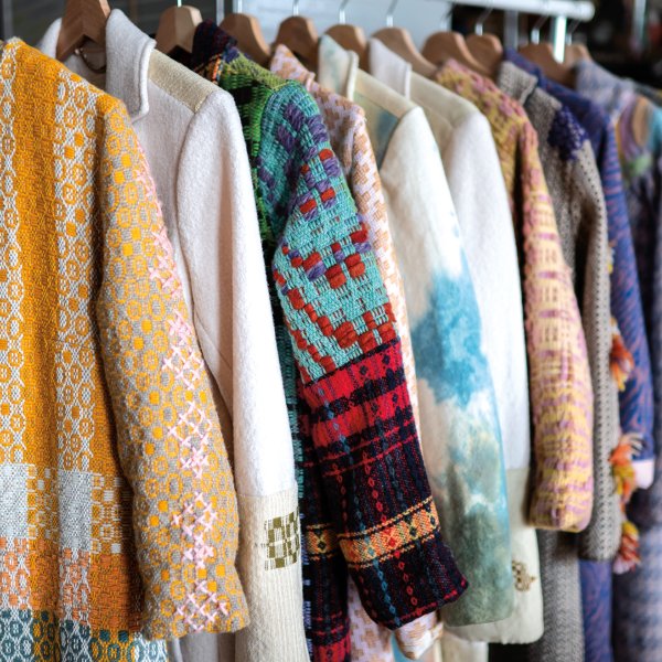 A sampling of Jensen’s one-of-a-kind handwoven and embroidered clothing. Photo by Caroline Yang.