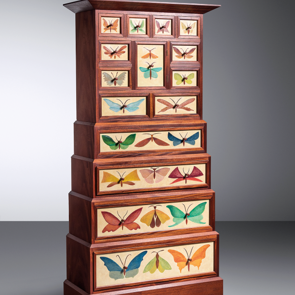 Judy Kensley McKie’s mahogany and mixed media Butterfly Cabinet, 1993, sold by Hindman in 2021 for $22,500.