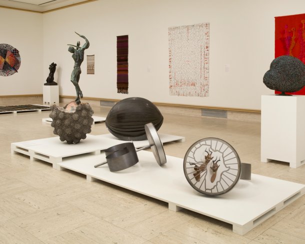 Museum exhibition floor with various contemporary sculptures