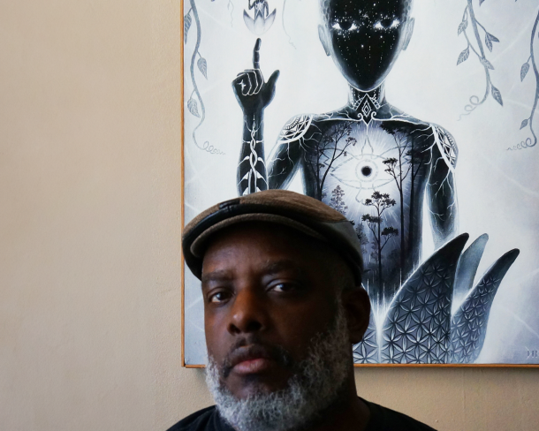 Dirk Joseph with his painting Fractal Being, 2023, acrylic on canvas. Photo by Dirk Joseph. 