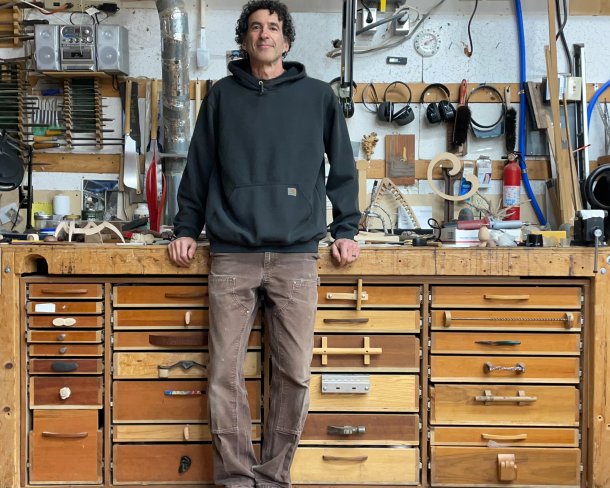 Seth Rolland at his work bench, 2024. Photo by Seth Rolland.