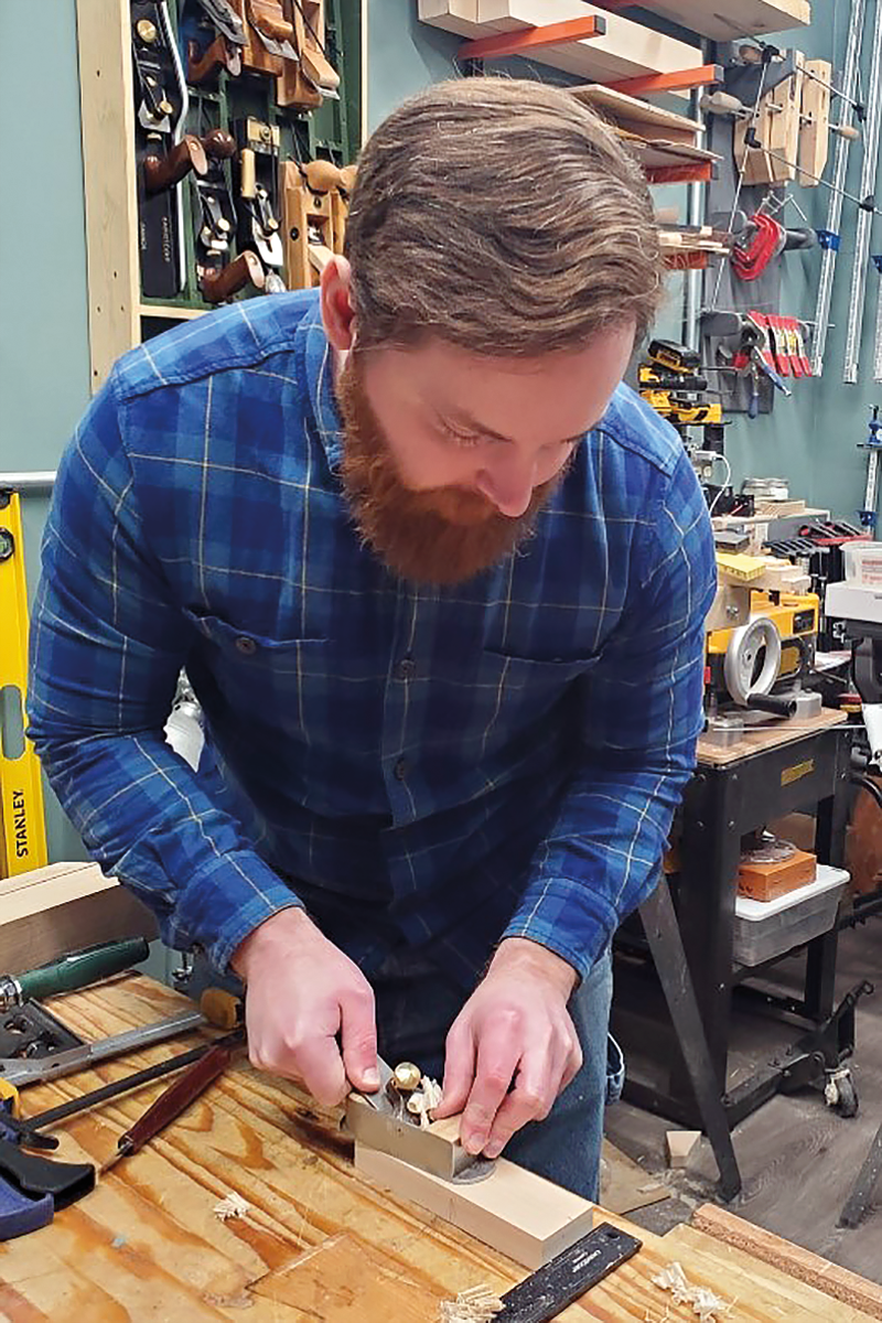 To create a hand plane component, Meyer shaves down a hunk of curly maple.
