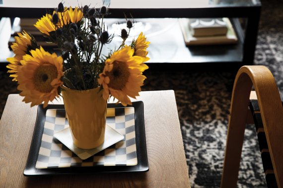 Judy Smilow Sunflowers And Stack Of Plates