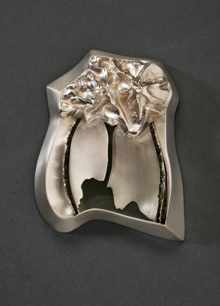 Colorado Summers, 1978, fabricated brooch, fine and sterling silver, Plexiglas, vinyl, 31/4”x23/4”x1/2”  (Die Neue Sammiung Pinakothek der Moderne, Munich, Germany)