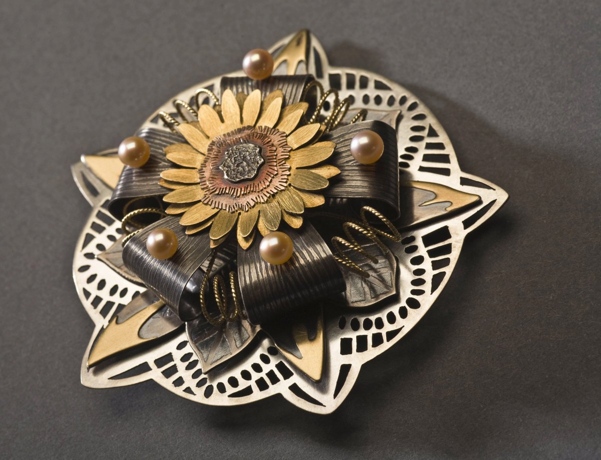Prague Celebration, 2009, fabricated brooch, sterling silver, 18 and 22k yellow gold, 18k red gold, apricot pearls, 31/4”diameter x 1”