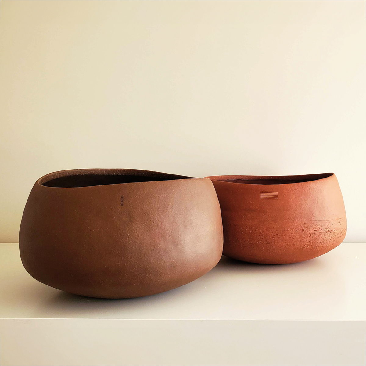 The coil-built bowls of hope/memory, 2023, were created with collaborators, 12 x 18 in.