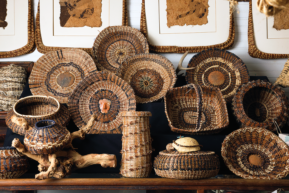 The artist’s pine needle baskets, some of which include Catawba clay centers, Tenerife pottery centers, or lids made with found turtle shells. 