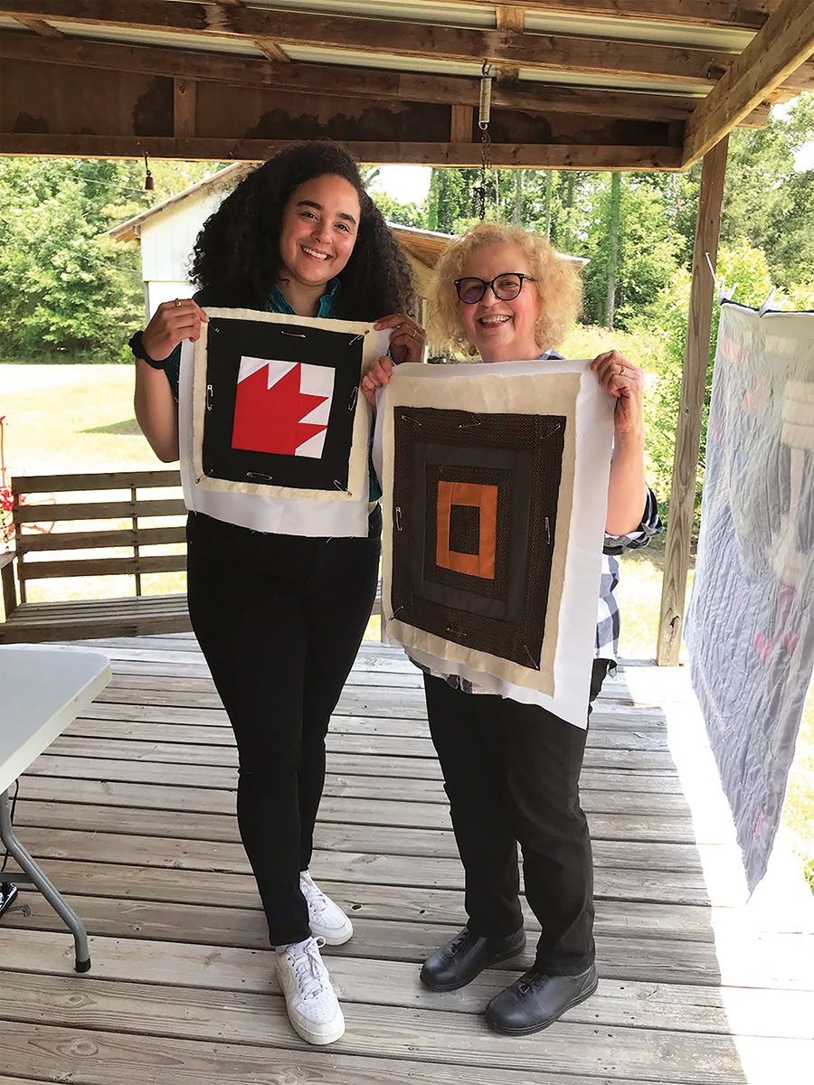 After finishing their quilt, Person (left) and Fabricand-Person made small quilt blocks to incorporate into future projects.