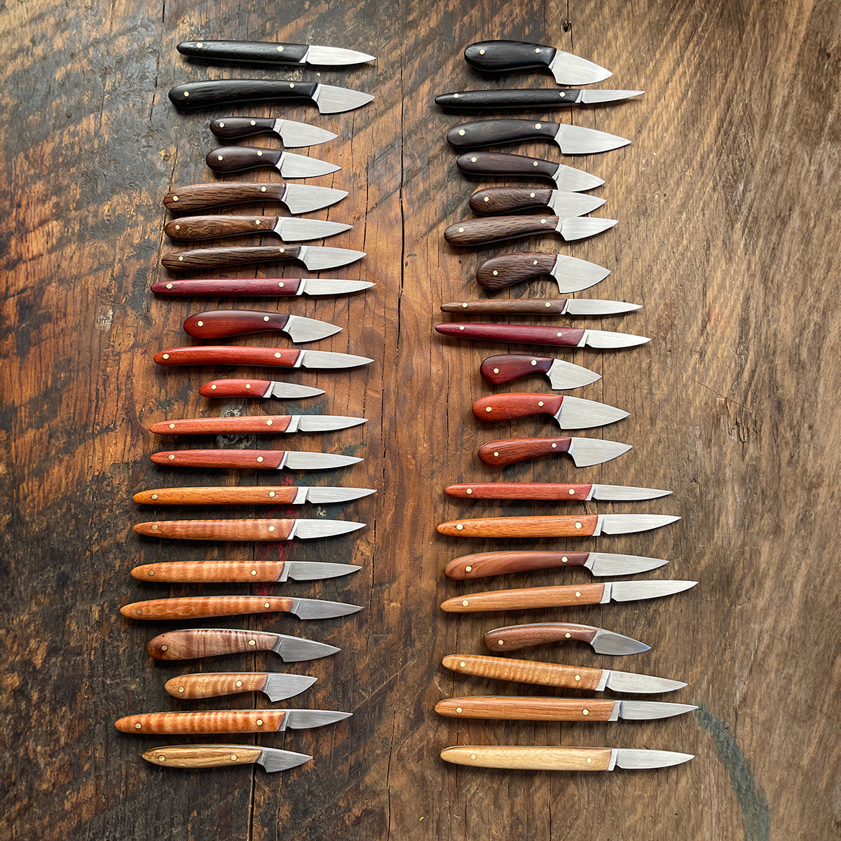 These miniature knives showcase a variety of hardwoods. Photo by Everett Noel.