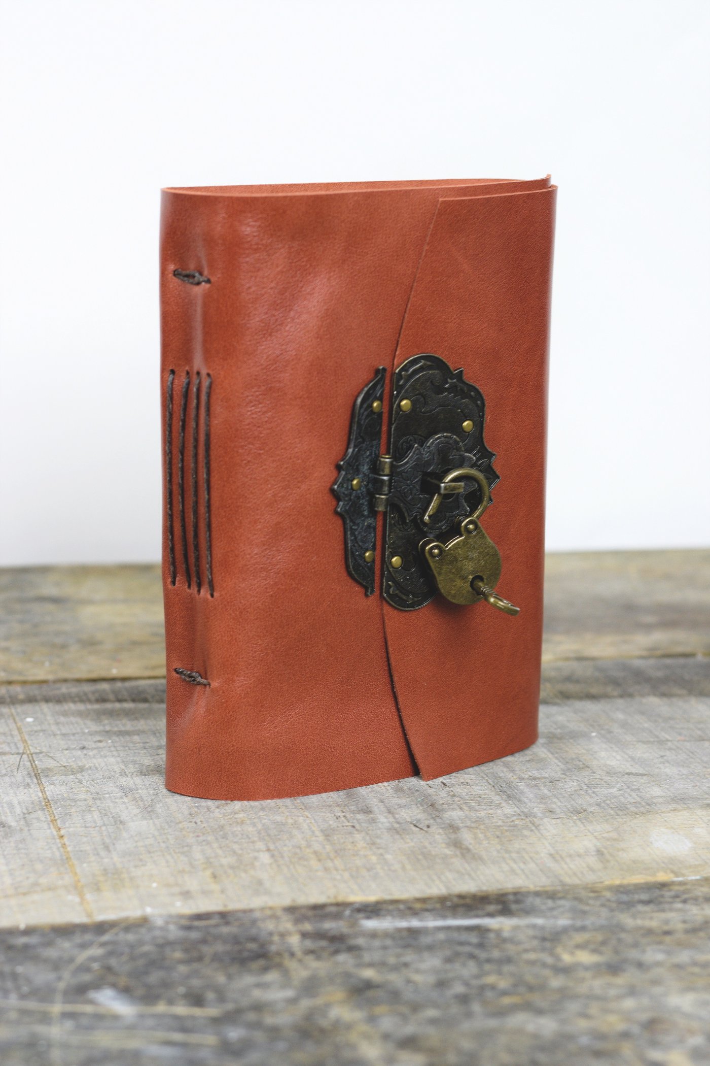 The cover of Your Secret Is Safe with Me, 2020, latches with a working lock and key, 6 x 5 x 2 in. Photo by Megan Winn. 