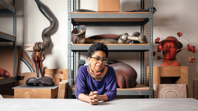 Syd Carpenter surrounded by her work in Philadelphia. Photo by Sahar Coston-Hardy.