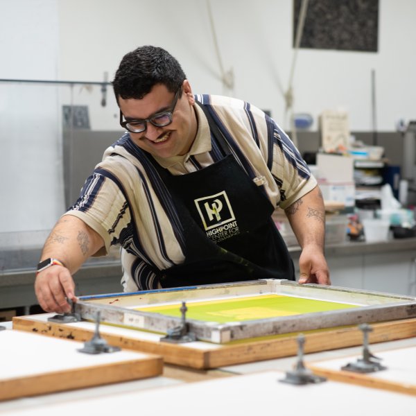 Instructor Edson Rosas prepares screens for a workshop at Highpoint Center for Printmaking in Minneapolis. Photo by Jenny Burwell, courtesy of Highpoint Center for Printmaking.