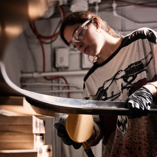 Greenberg works on a custom mirror commission. Photo by Cody Perhamus.