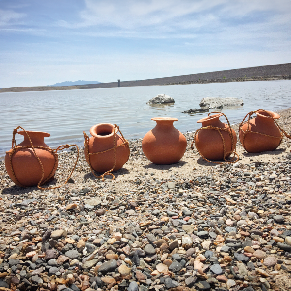 Leonard's water vessels in BREACH: Logbook 17 “Walking Cochiti Dam | The Return” in Cochiti Pueblo Territory, New Mexico. Photo courtesy of the artist.
