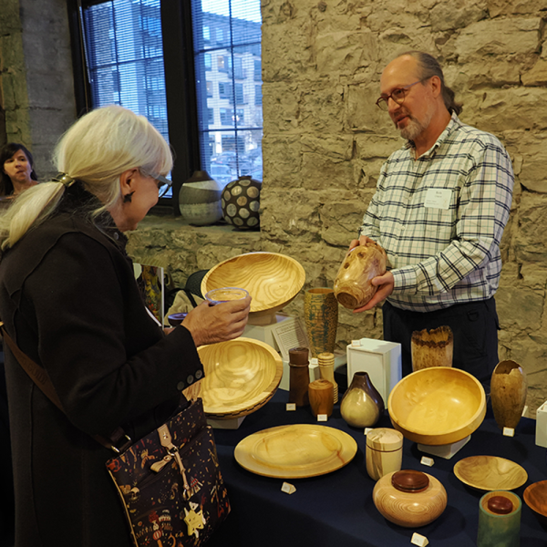 artist selling wood turned items