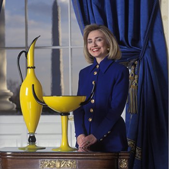 Hillary Rodham Clinton stands next to Yellow Pair