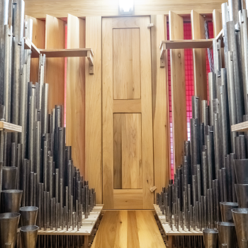 Renowned organ builder Martin Pasi recently expanded the 1961 Hotkamp organ at St. John's Abbey to include 6,000 pipes. Photos by Caroline Yang.
