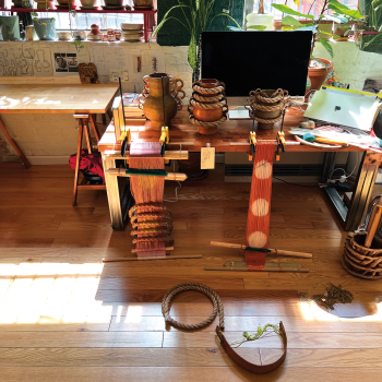 A large desk anchors the workstation in Terumi Saito’s home studio. Photo by Izaac Costiniano.