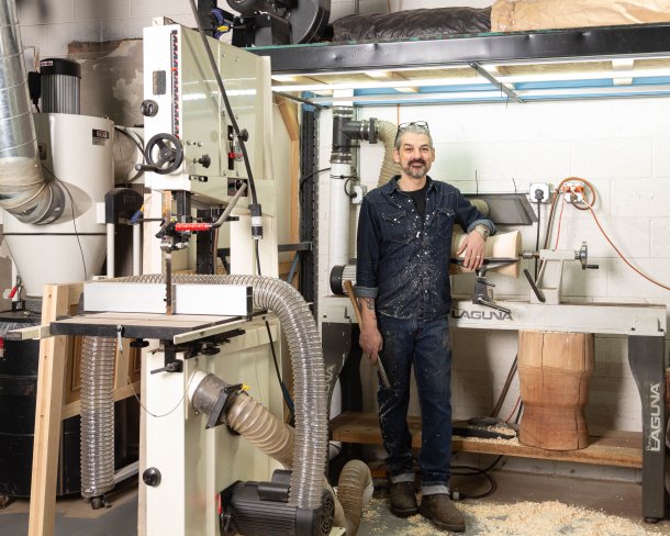 Woodworker, furniture maker, and designer Marvin Freitas in his Minneapolis workshop. Photo by Dina Kantor.