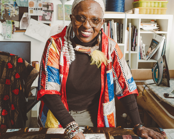 Diana N’Diaye with Ba and Her Daughters, a quilt she made to honor her great grandmother. Photo by Reginald Cunningham.