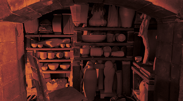 The packed inside of a wood-fire kiln.