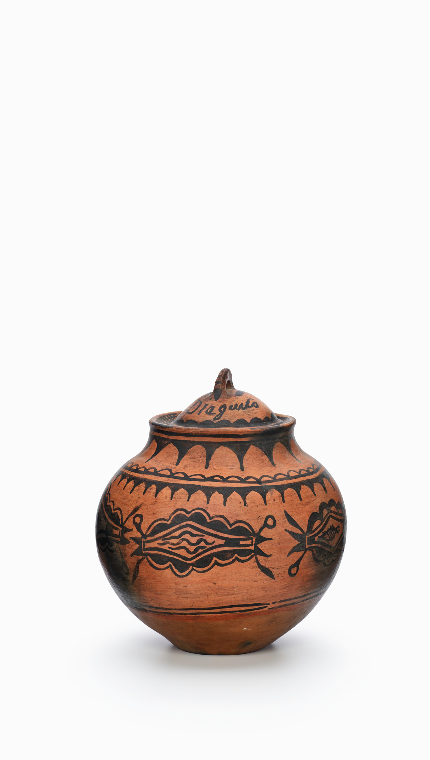 Small lidded ceramic jar with black painted detail