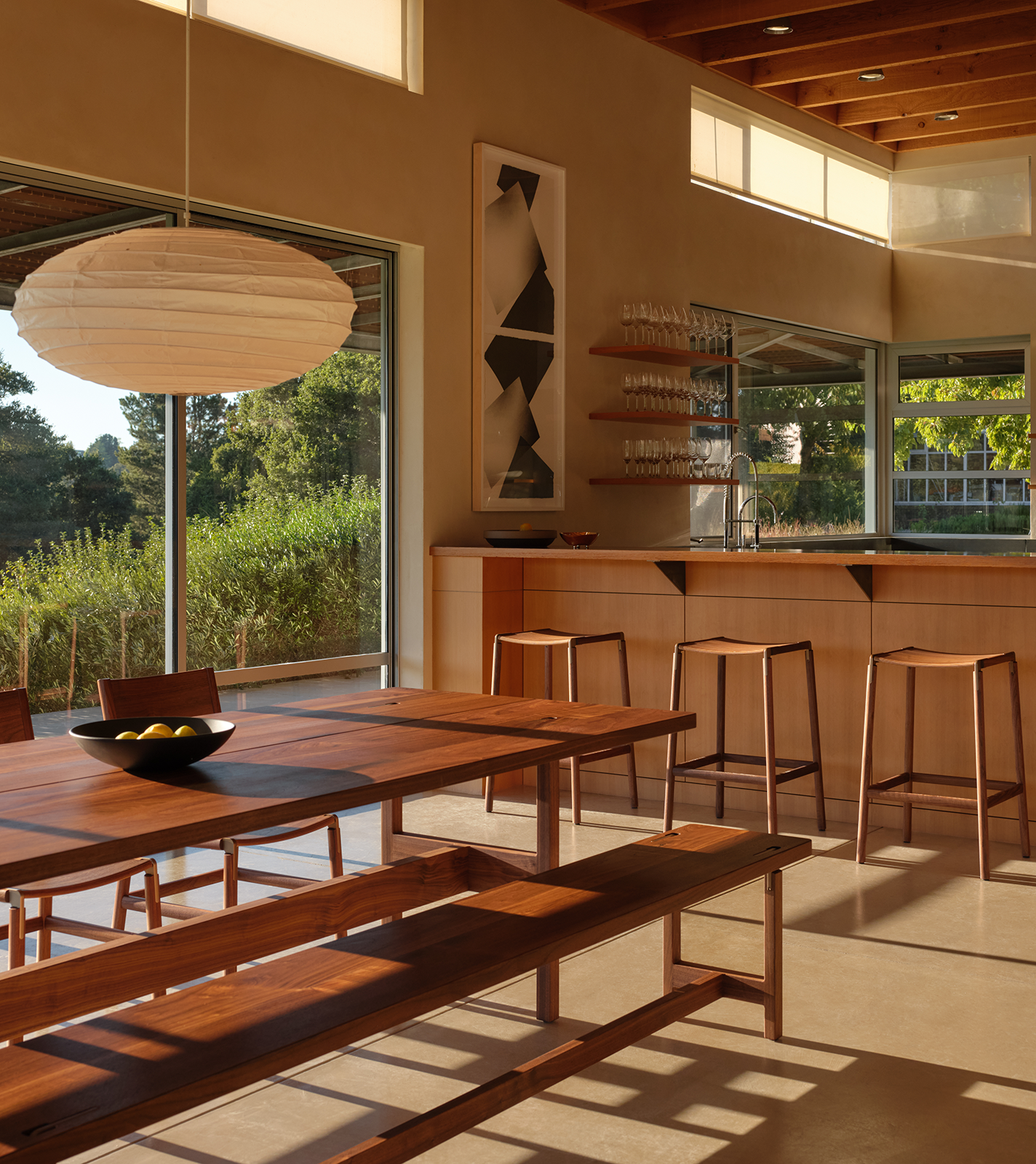 Wood dining set and bar stools in dining room
