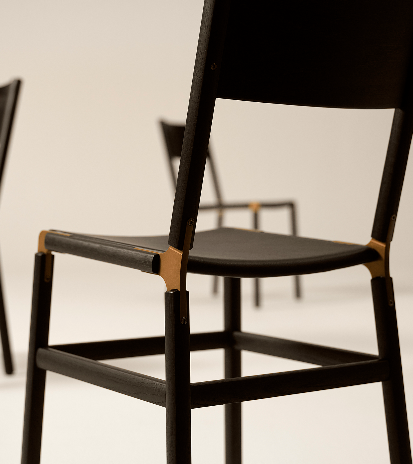 Chair with anodized aluminum and stainless steel bracket system