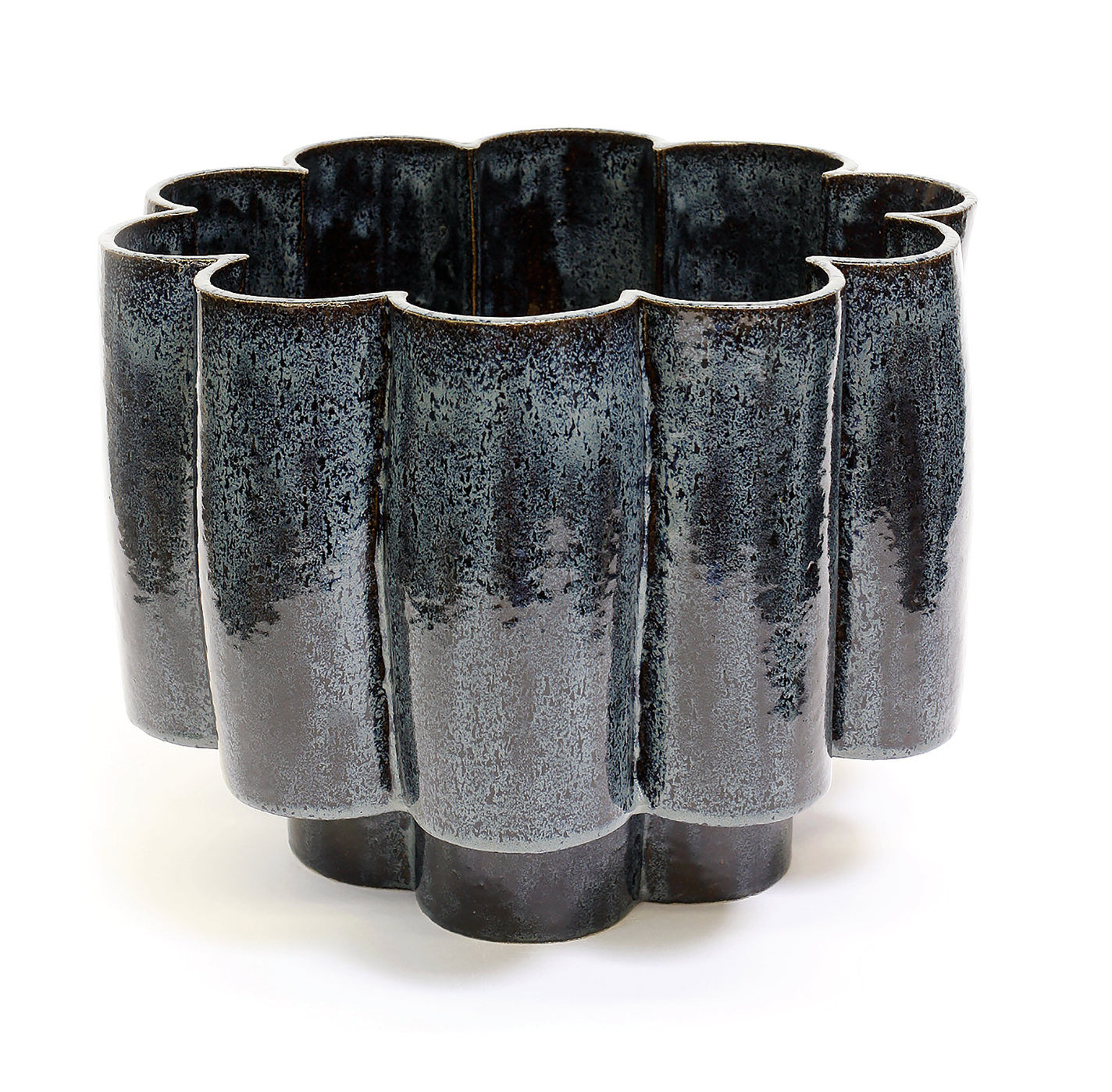 Large, scalloped ceramic planter in deep blue