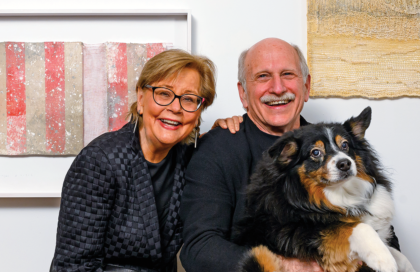 Rhonda Brown and Tom Grotta with their dog, Cassidy.