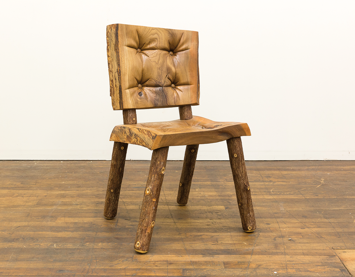 Wooden chair with the illusion of tufted upholstery