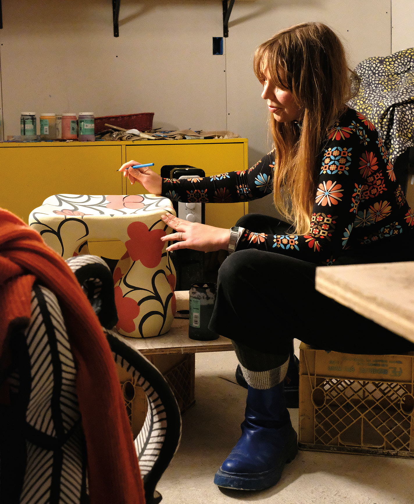 Ariana Heinzman working in her studio.
