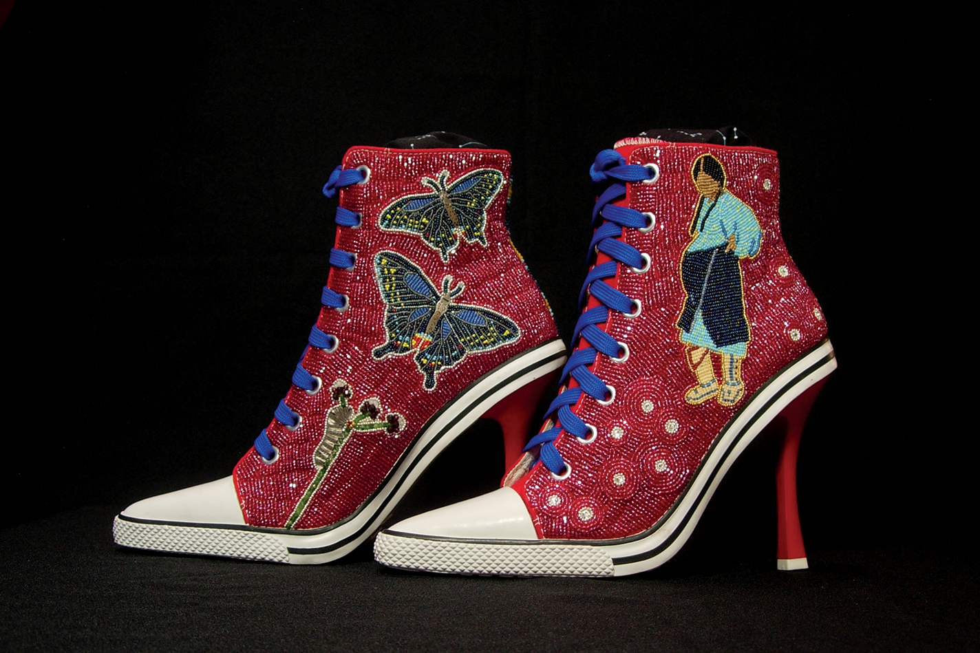 Intricately beaded high-heeled Chuck Taylors