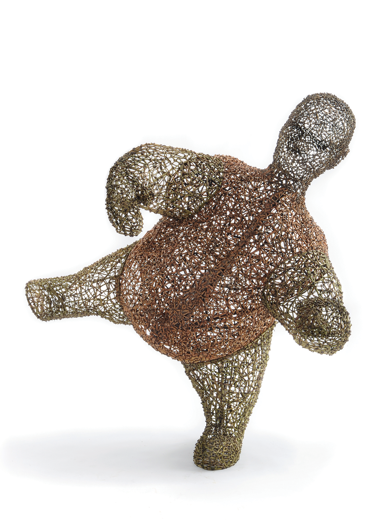 Person-shaped sculptural basket made of sticks and string.