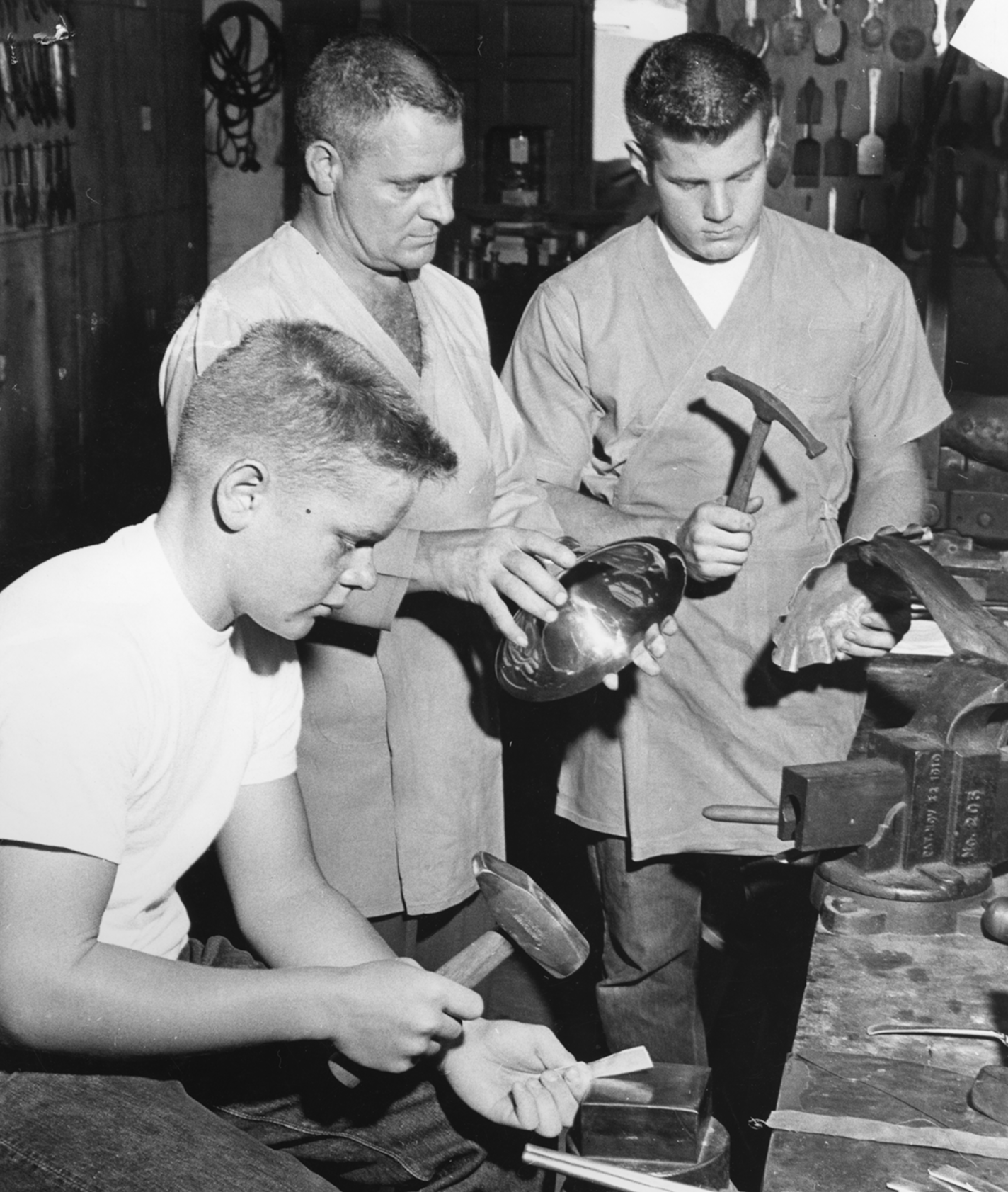 Silversmith Lewis A. Wise with students.