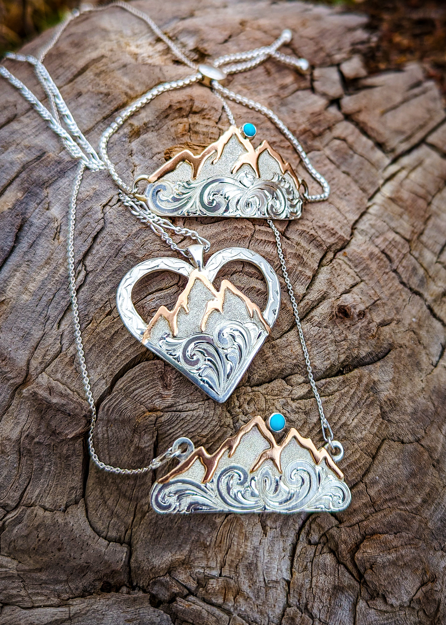 Sterling silver pendants depicting the Teton Mountains