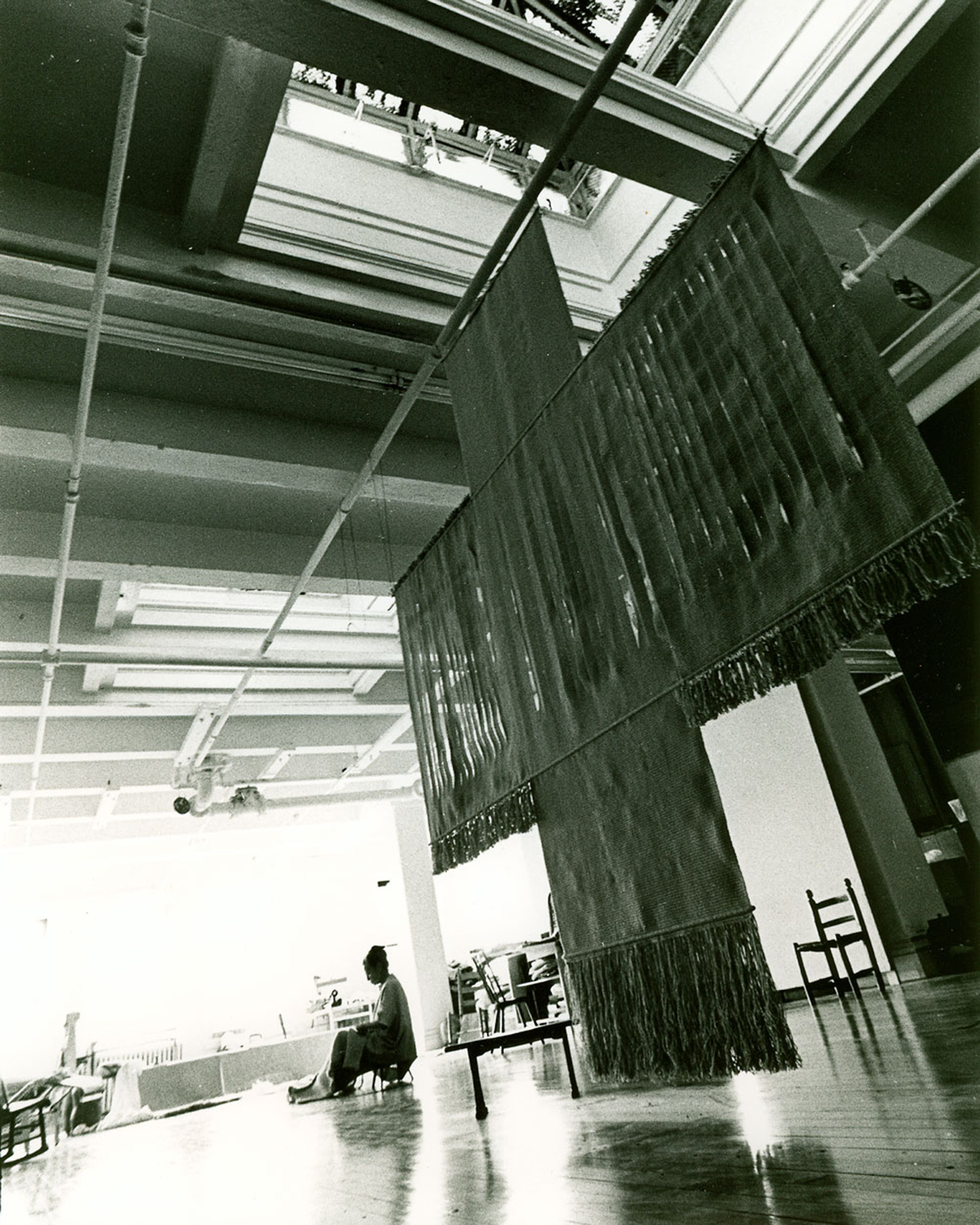 A view of Lenore Tawney in her studio.