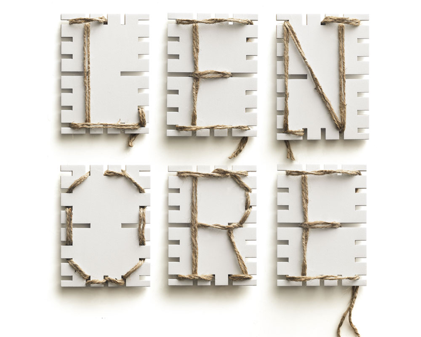 Twine on cardboard spelling LENORE