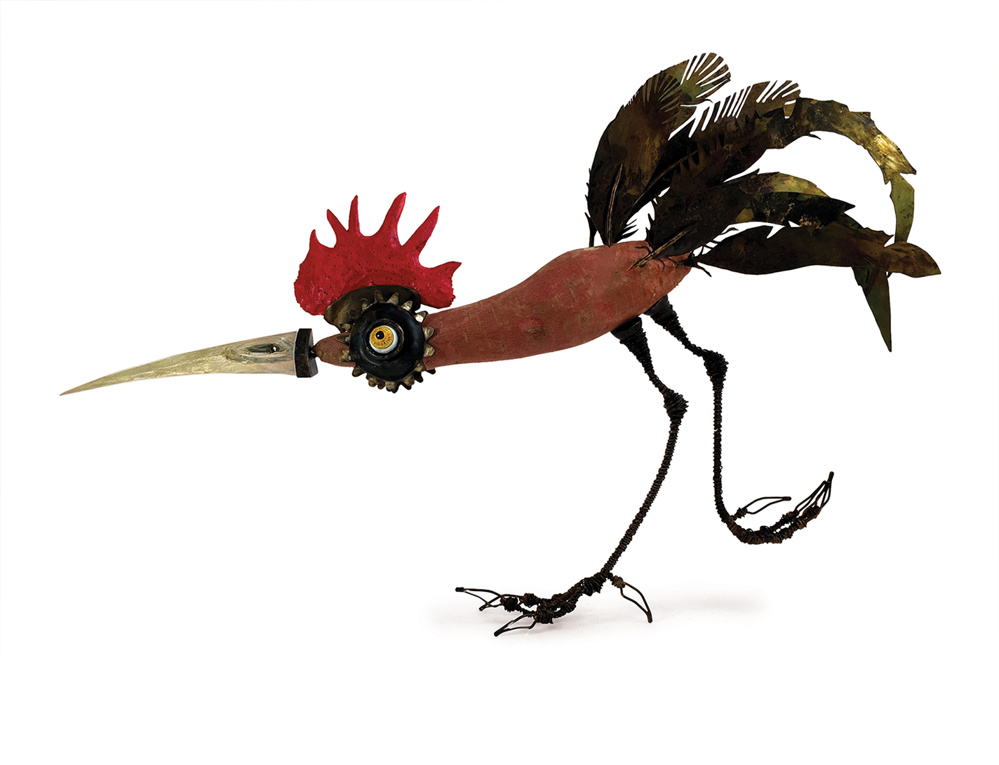 Whimsical chicken sculpture with a yam for a torso
