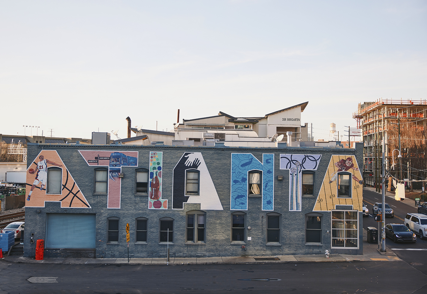 Downtown Atlanta Mural with the word ATLANTA in block letters filled with scenes.