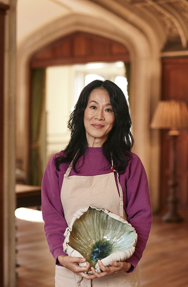 Kate Pak holding one of her vessels