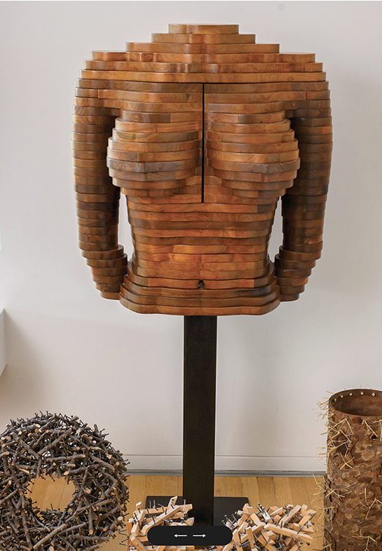 A figurative cabinet by Edgar and Joyce Anderson.