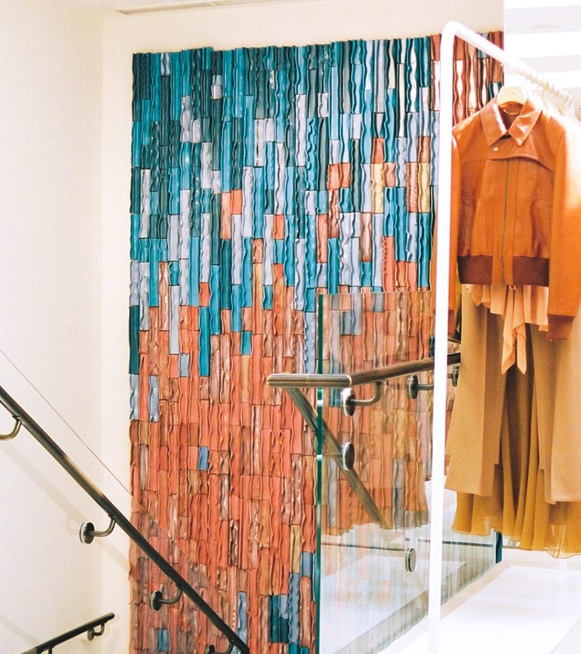 Ceramic wall piece on the wall of luxury boutique Chloé Melrose Place.