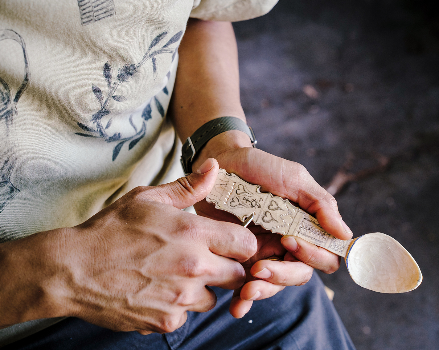 Thompson chip carving a Breton spoon.